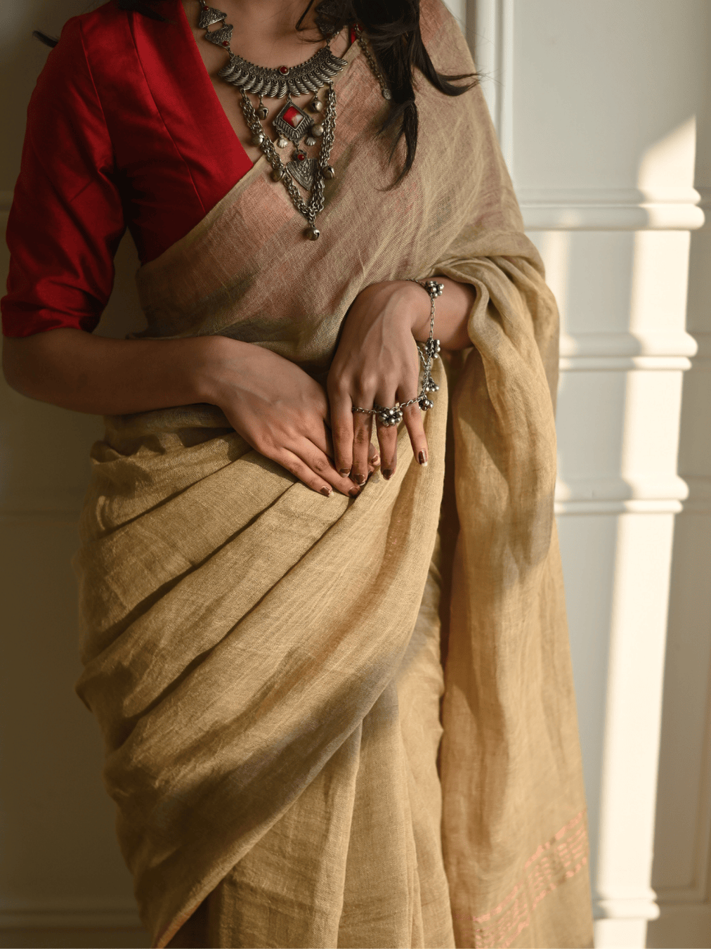 Beige pure handloom linen saree with zari border from MAYIN India