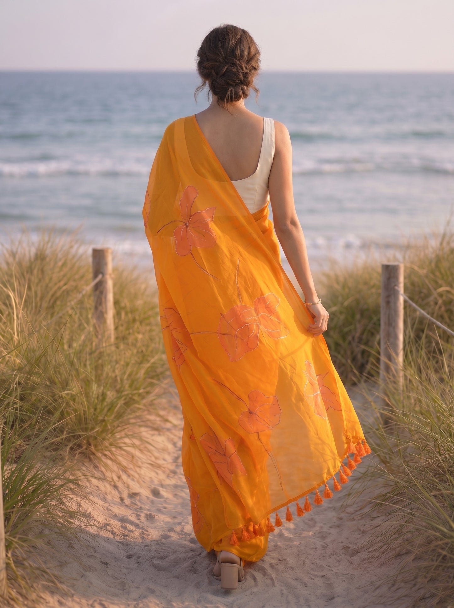 Anthuria- Orange Handpainted Mulmul Saree