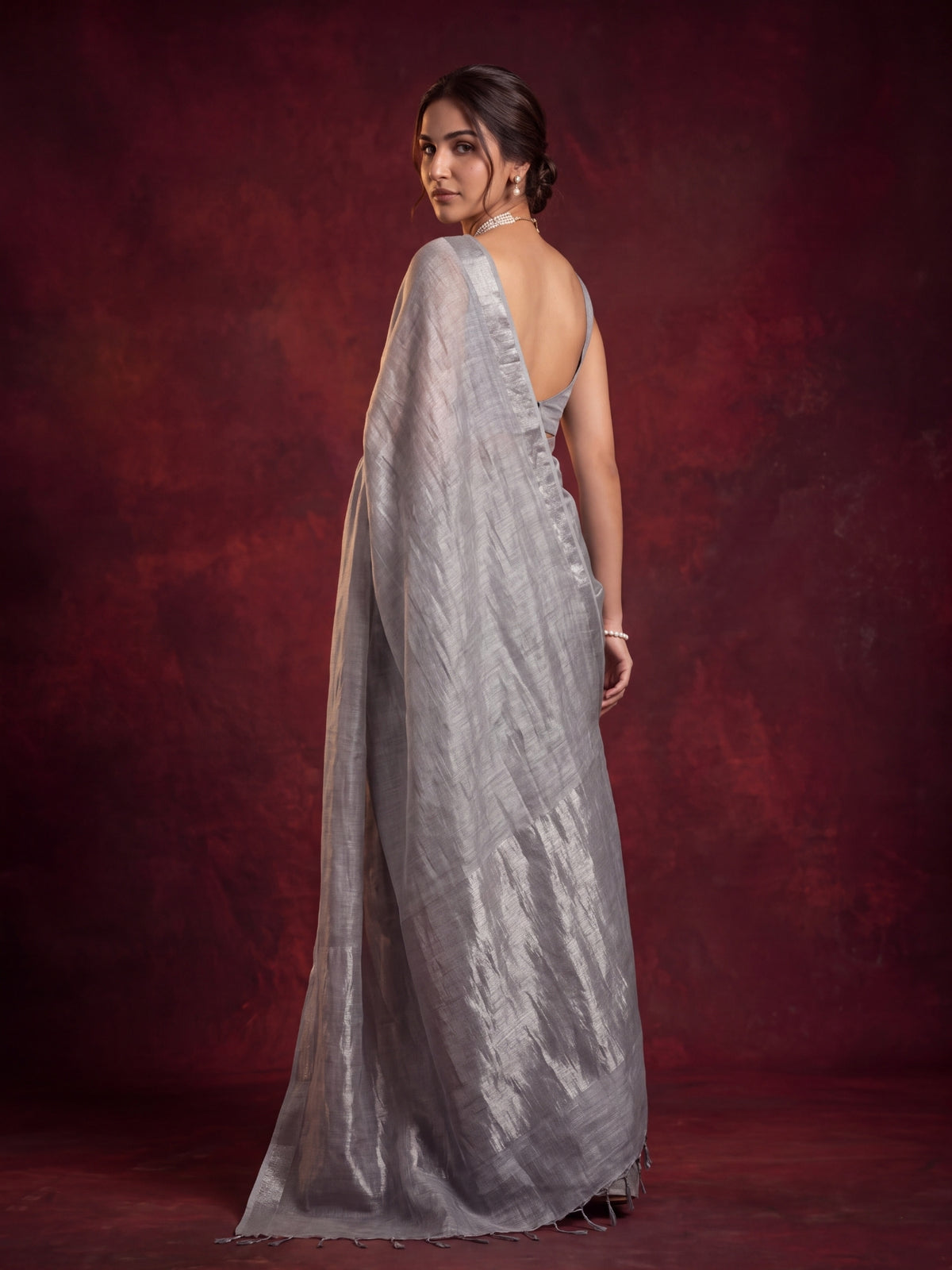 Silver plain silver linen tissue saree, drape detail, by MAYIN