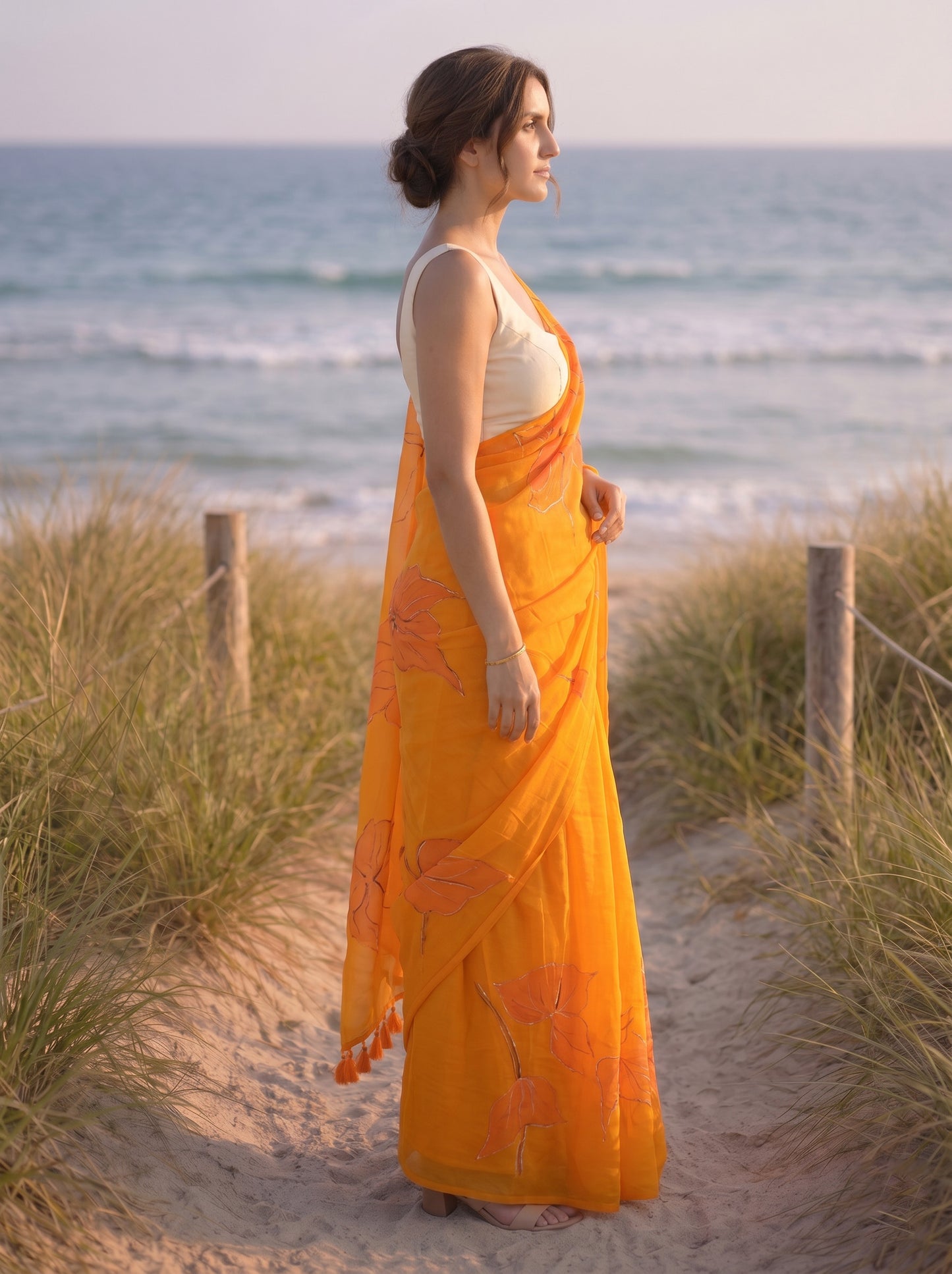 Anthuria- Orange Handpainted Mulmul Saree