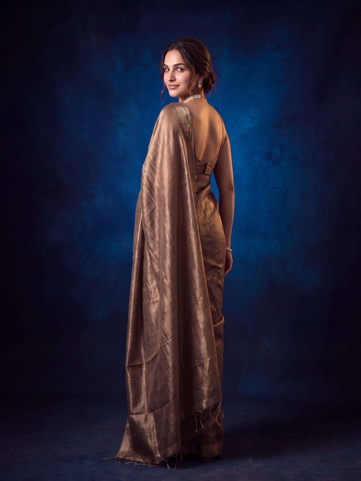 Ivara plain bronze tissue saree, drape detail, by MAYIN